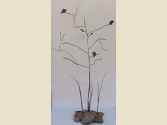 Steel tree with three birds