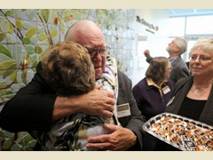 Dedication Day - The couple who donated the money for the mural, they carved some of the tiles with me