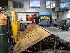 Joe Hottinger welding two of the large panels together. This is Corten steel.