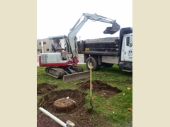 The hole for the foundation dug and ready to receive the sculpture.